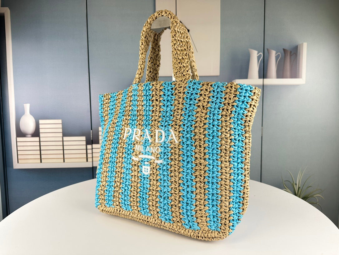 PRA* 24SS Hollow Woven Raffia Shopping Bag