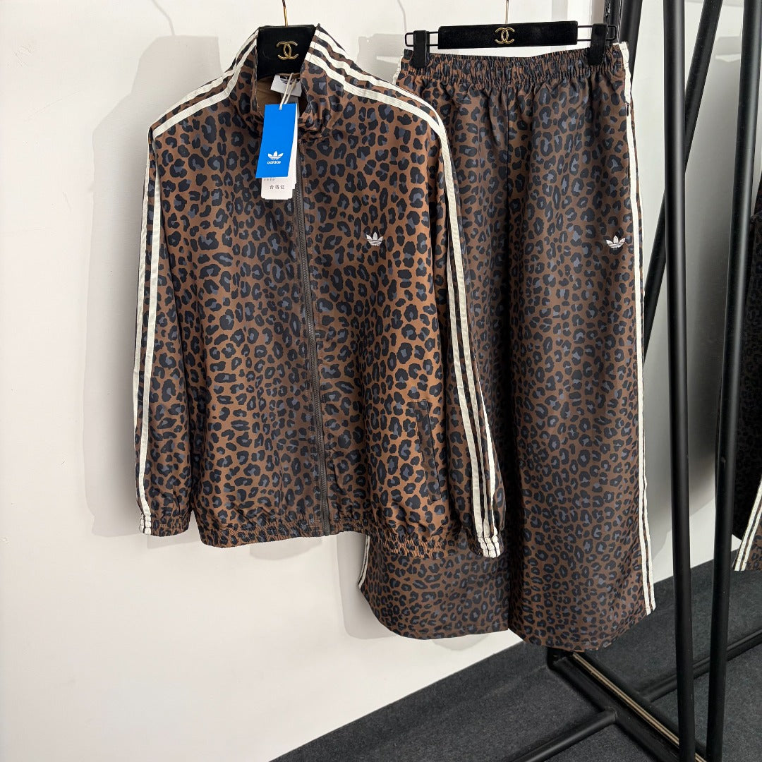 Leopard-print zip-up jacket + high-waisted wide-leg trousers