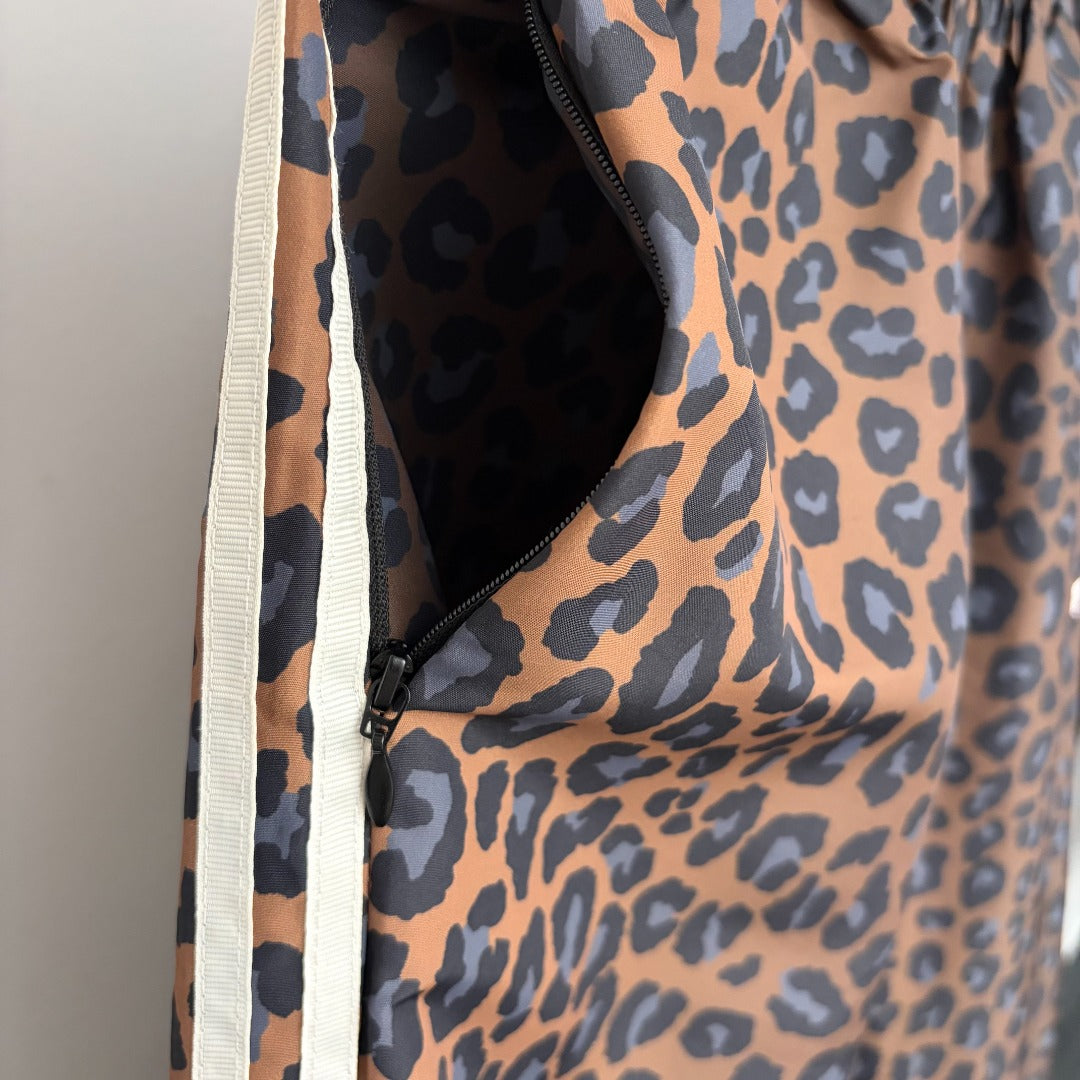 Leopard-print zip-up jacket + high-waisted wide-leg trousers