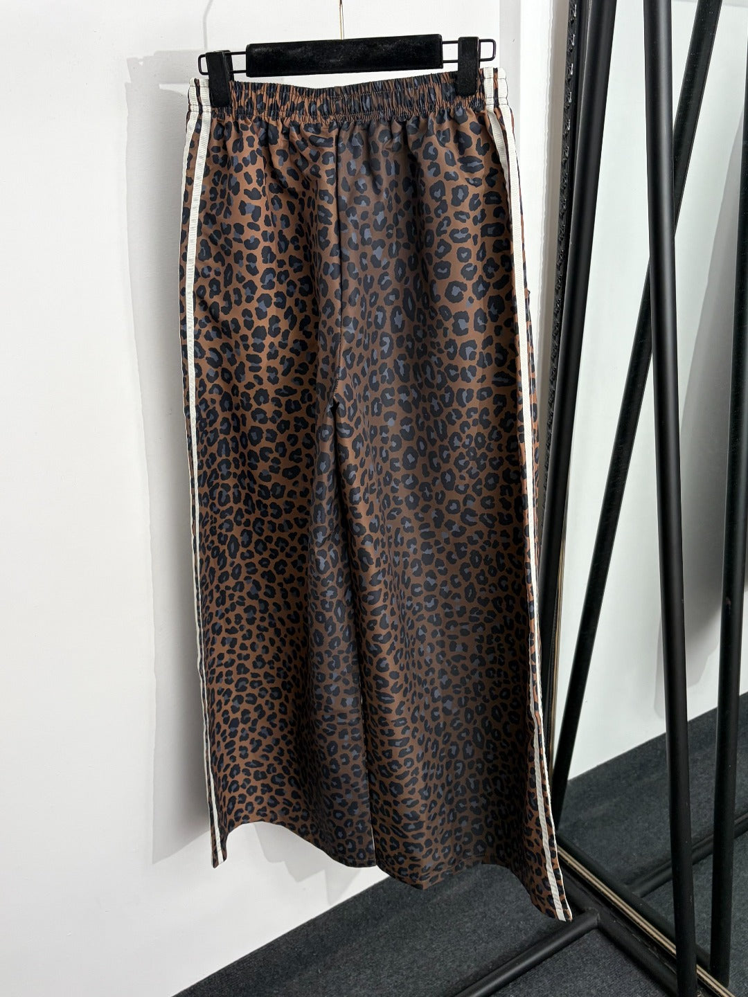 Leopard-print zip-up jacket + high-waisted wide-leg trousers