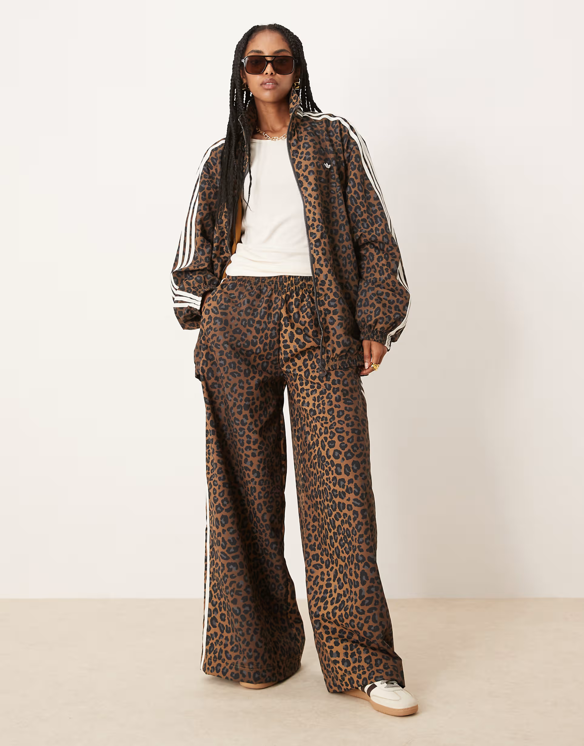 Leopard-print zip-up jacket + high-waisted wide-leg trousers