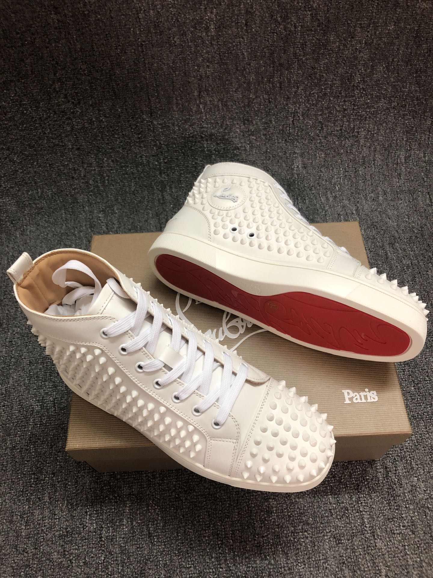 Loubouti* new red-soled white rivet high-top shoes