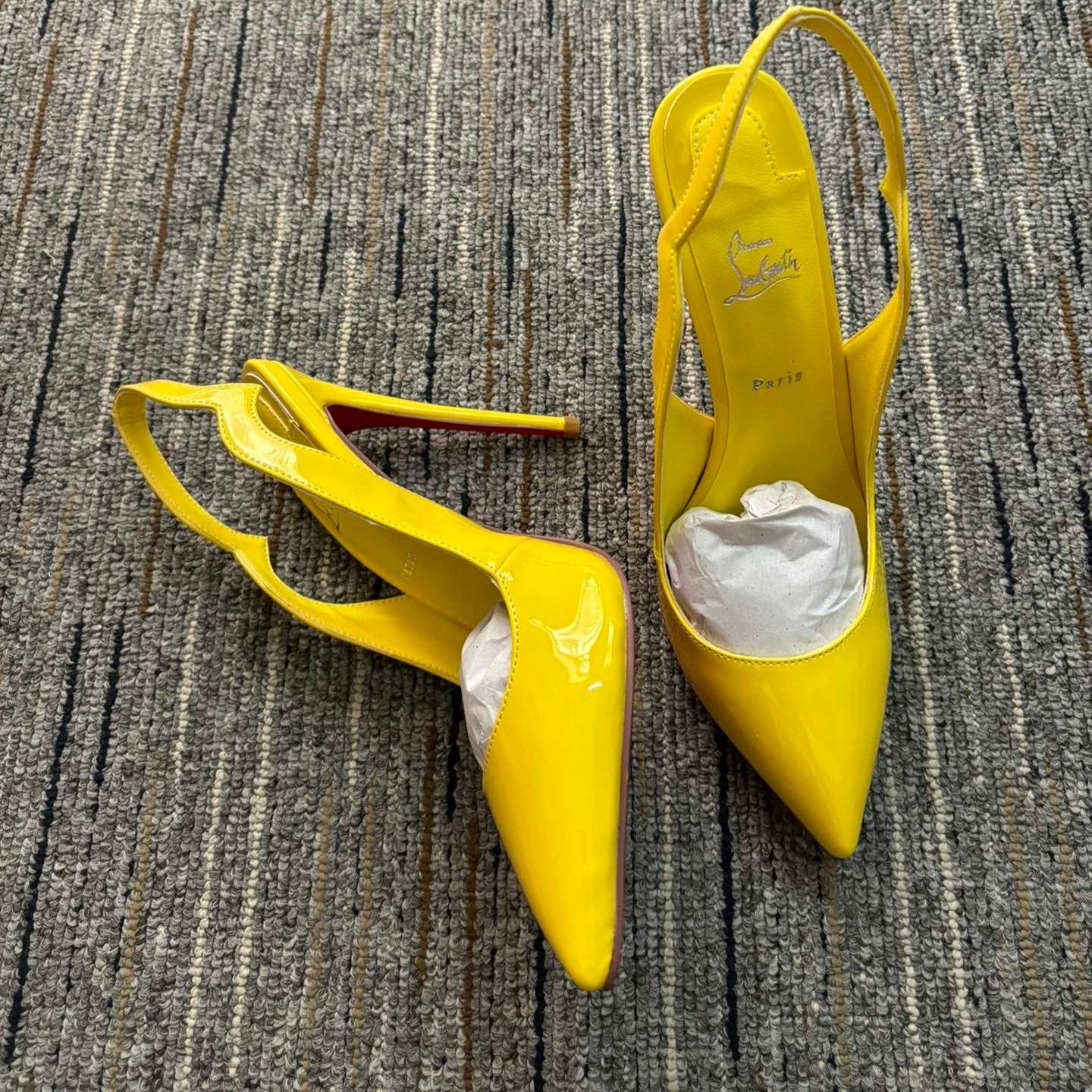 Christia** Loubout** new yellow high heels