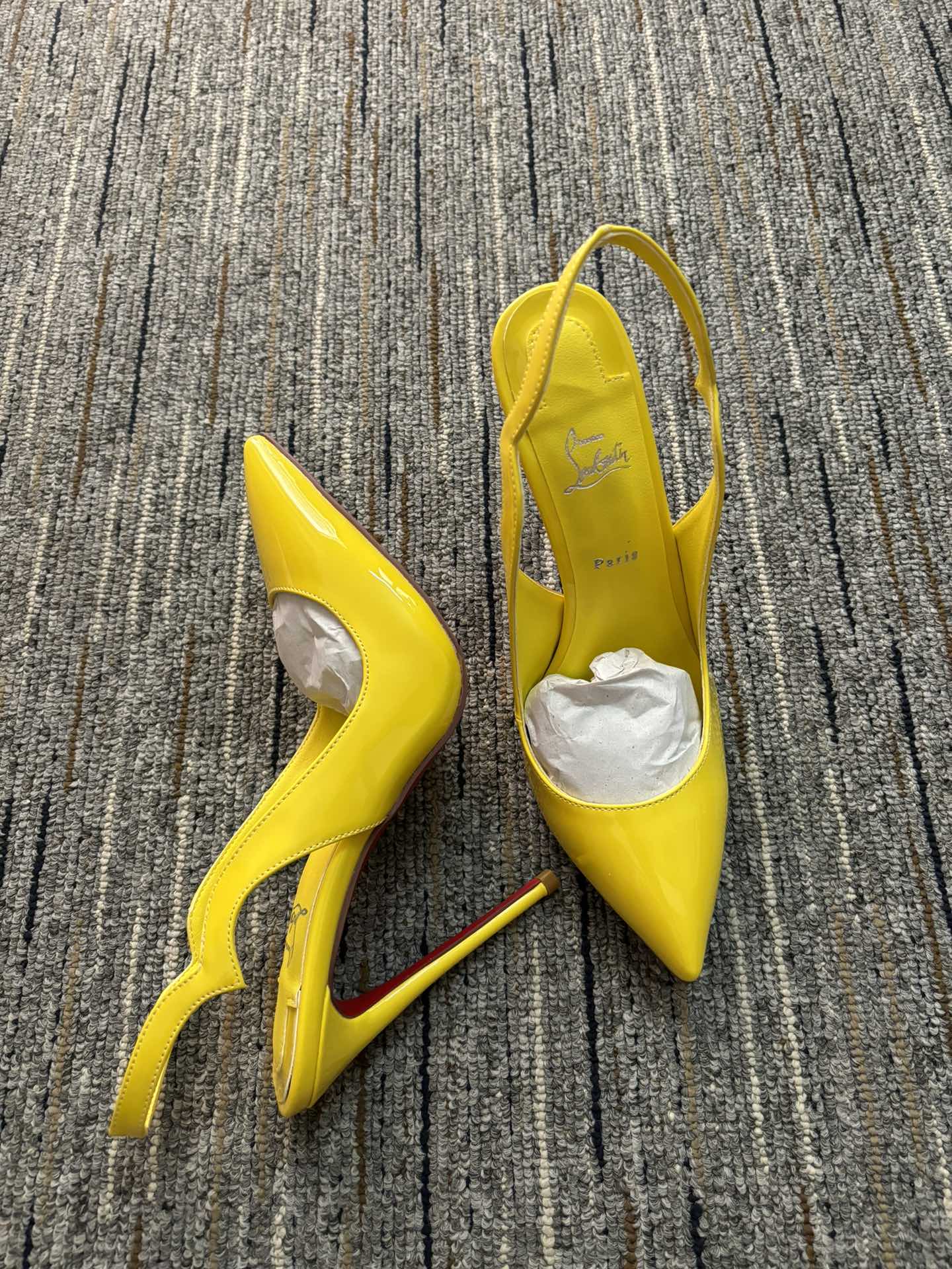 Christia** Loubout** new yellow high heels