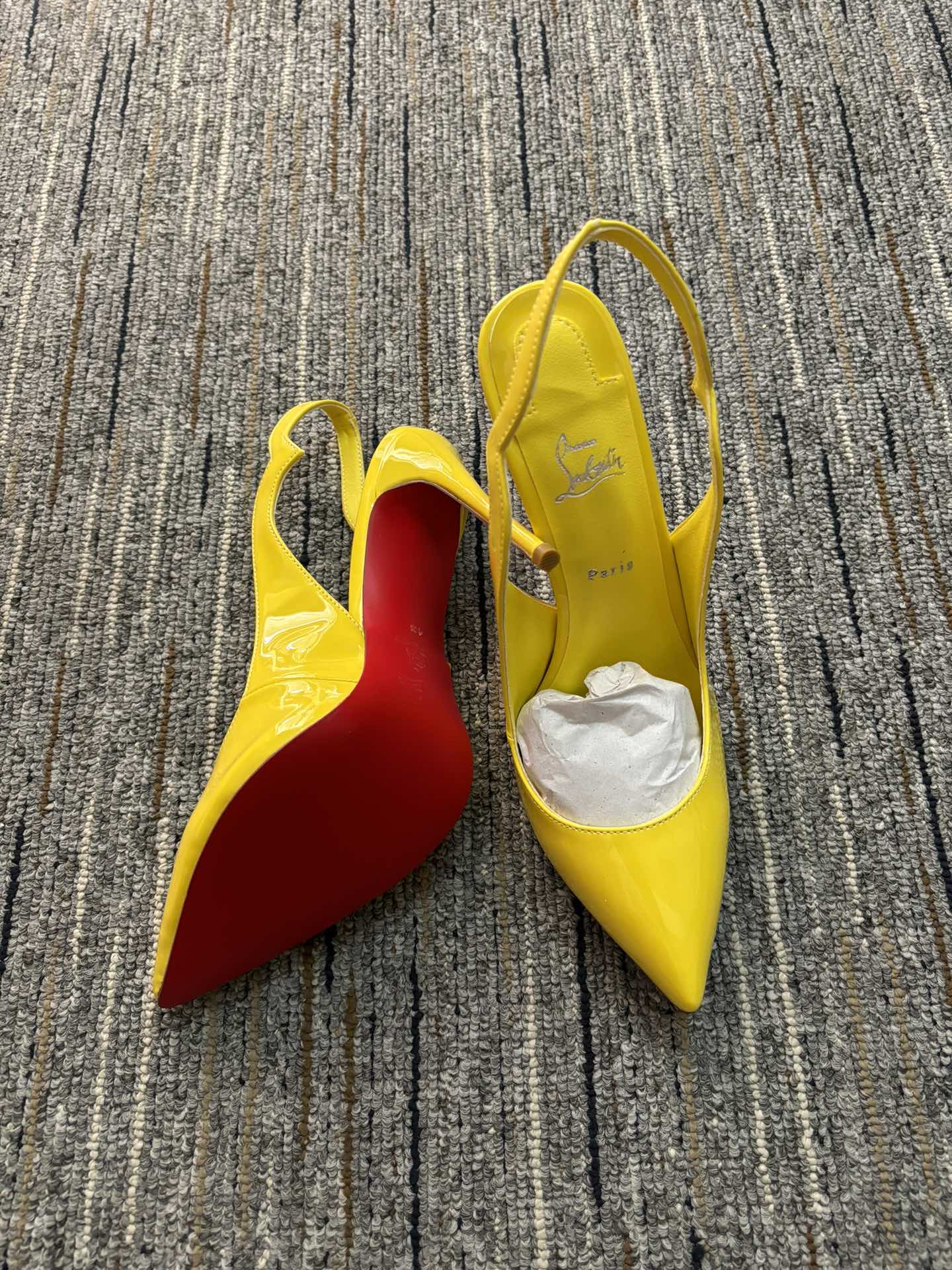 Christia** Loubout** new yellow high heels
