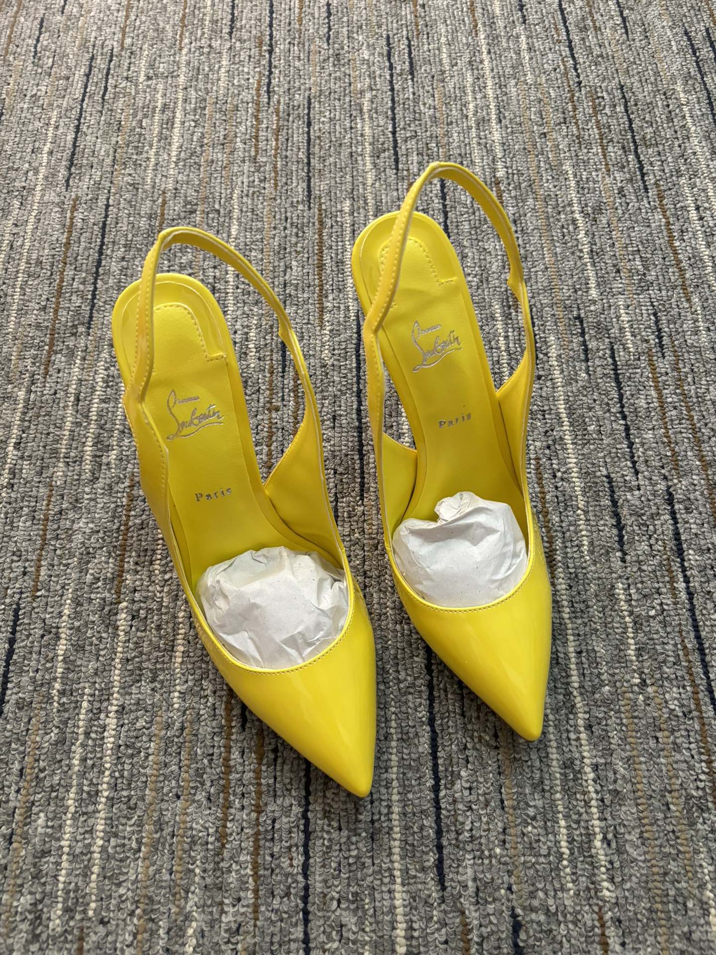 Christia** Loubout** new yellow high heels
