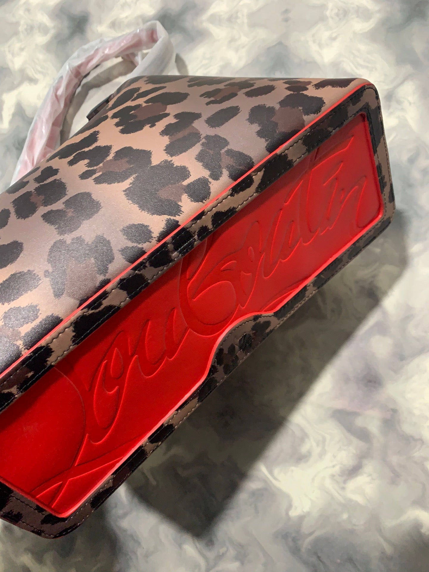 Christi** Loubout** Leopard print handbag