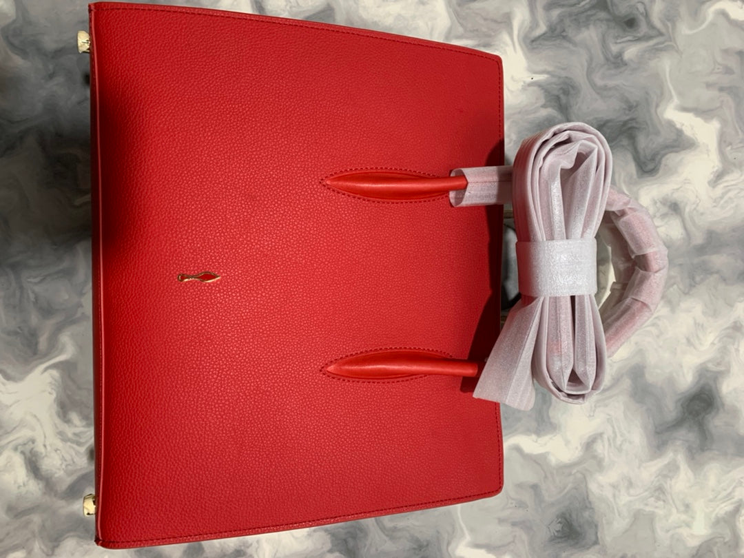 Christi** Loubout** red handbag