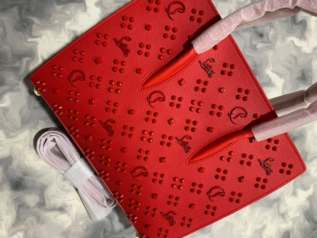 Christi** Loubout** red handbag