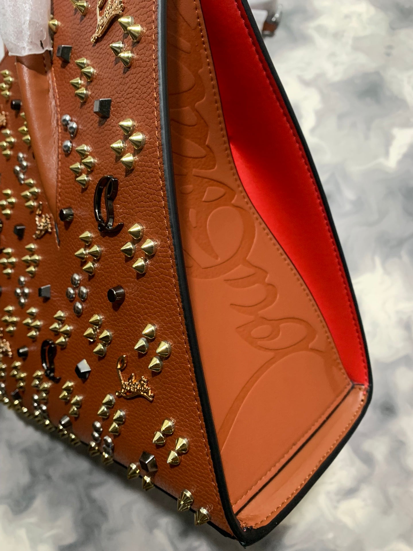 Christi** Loubout** red handbag