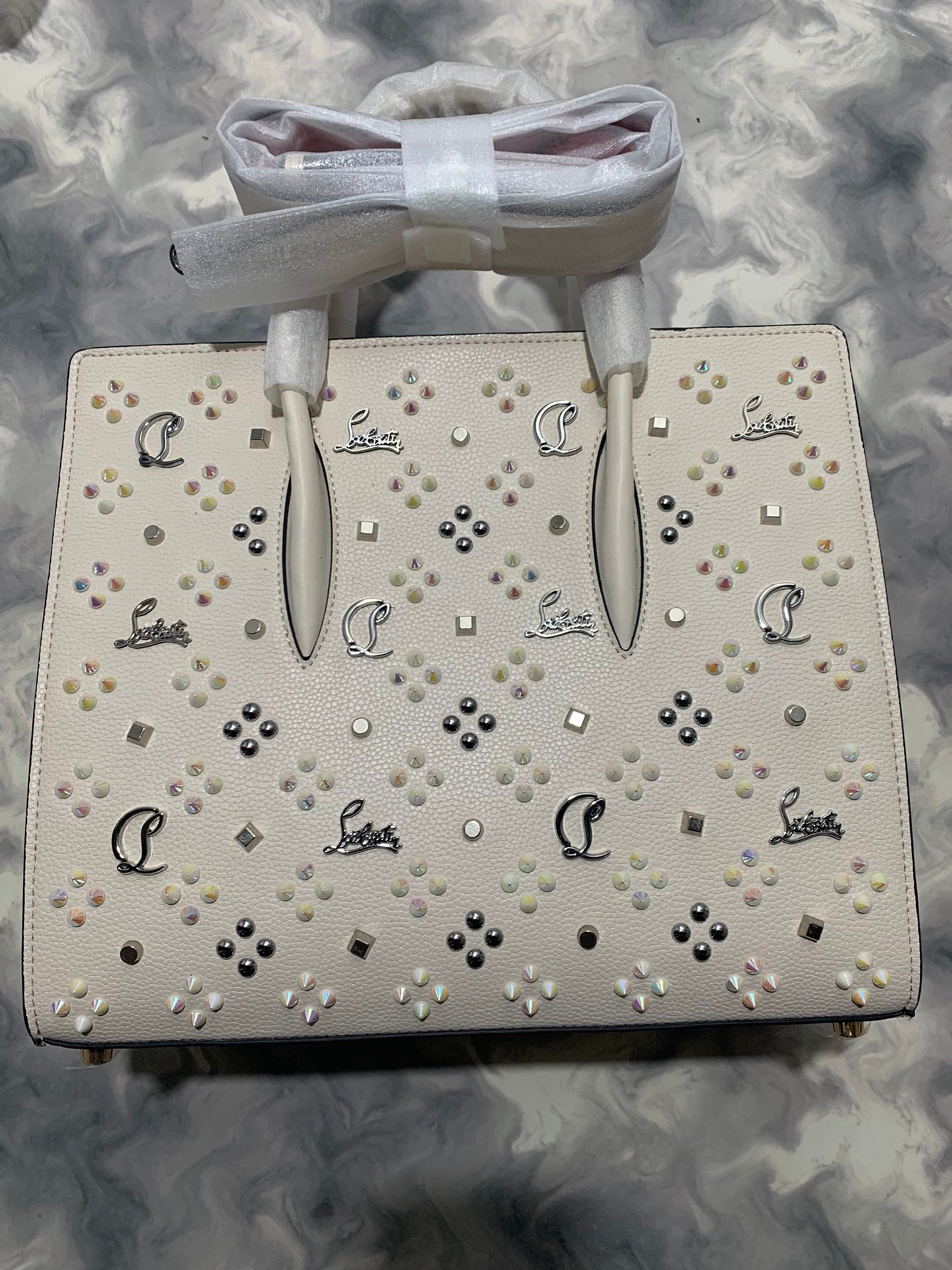 Christi** Loubout** red handbag