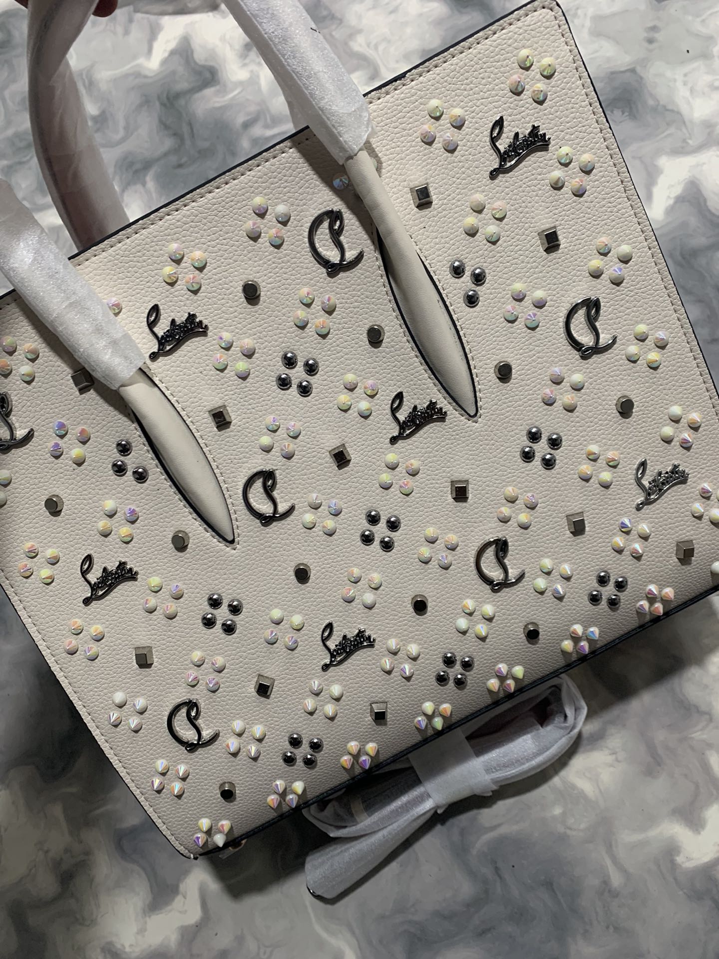 Christi** Loubout** red handbag