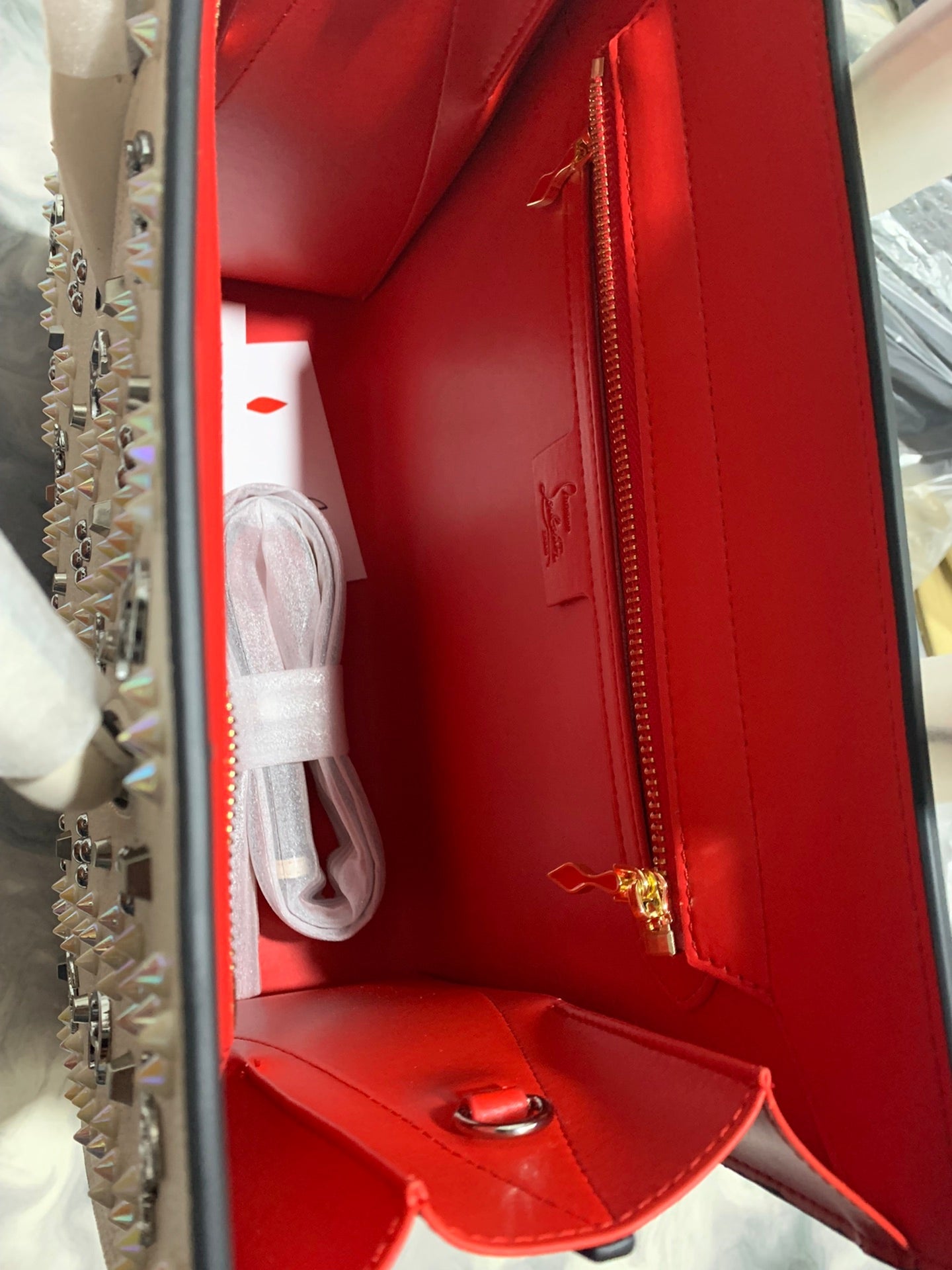 Christi** Loubout** red handbag