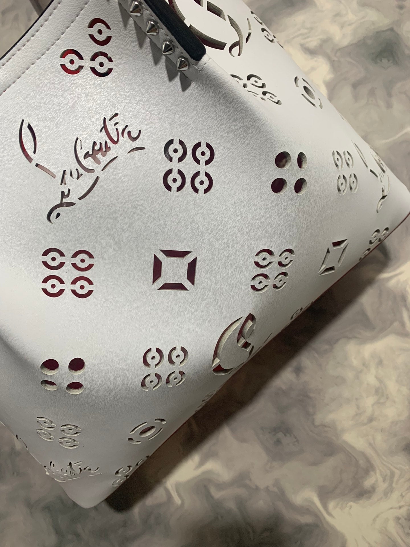 Christi** Loubout** hollow handbag