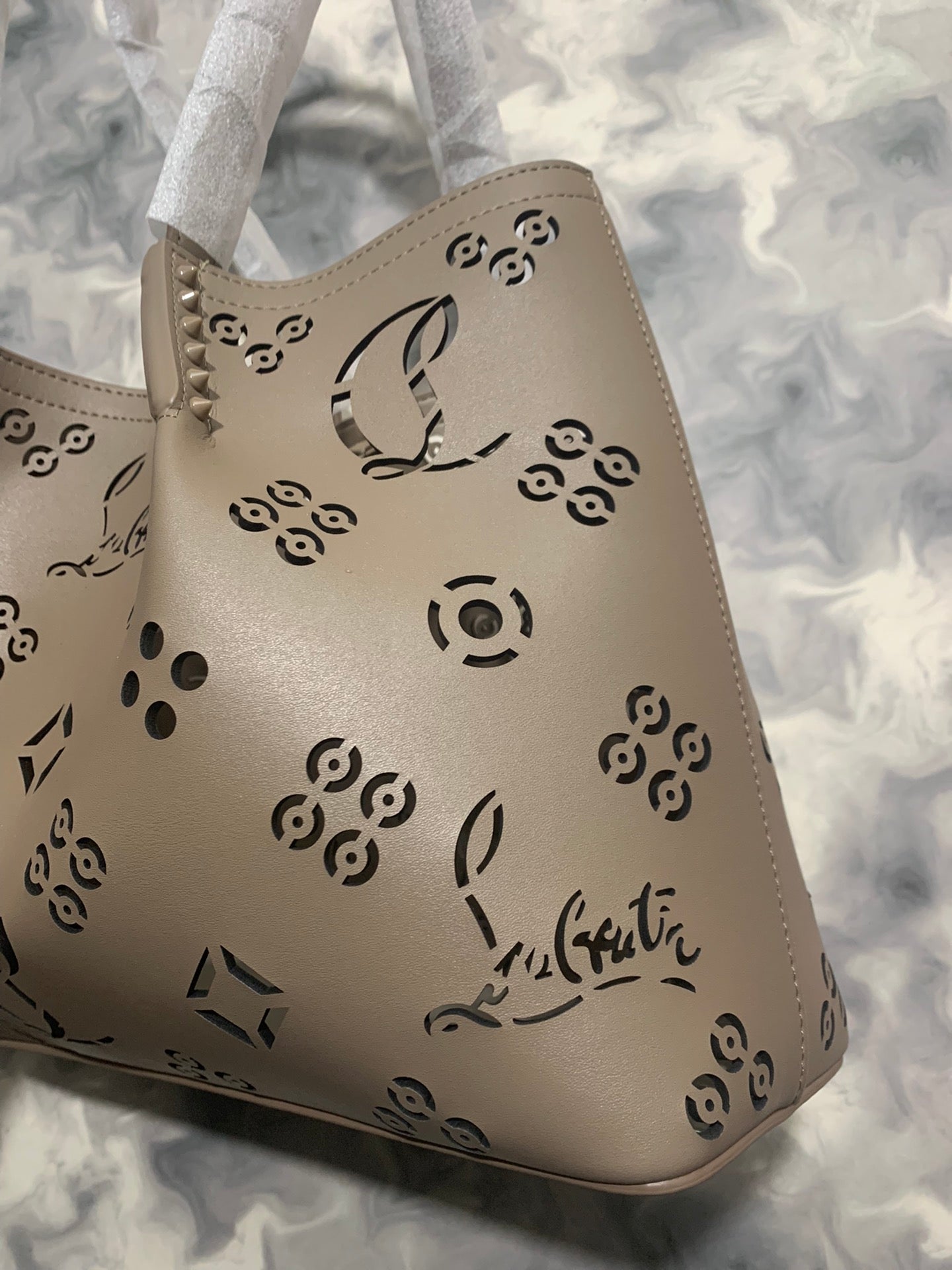 Christi** Loubout** hollow handbag