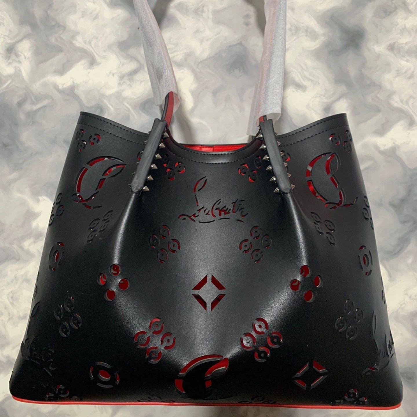 Christi** Loubout** hollow handbag