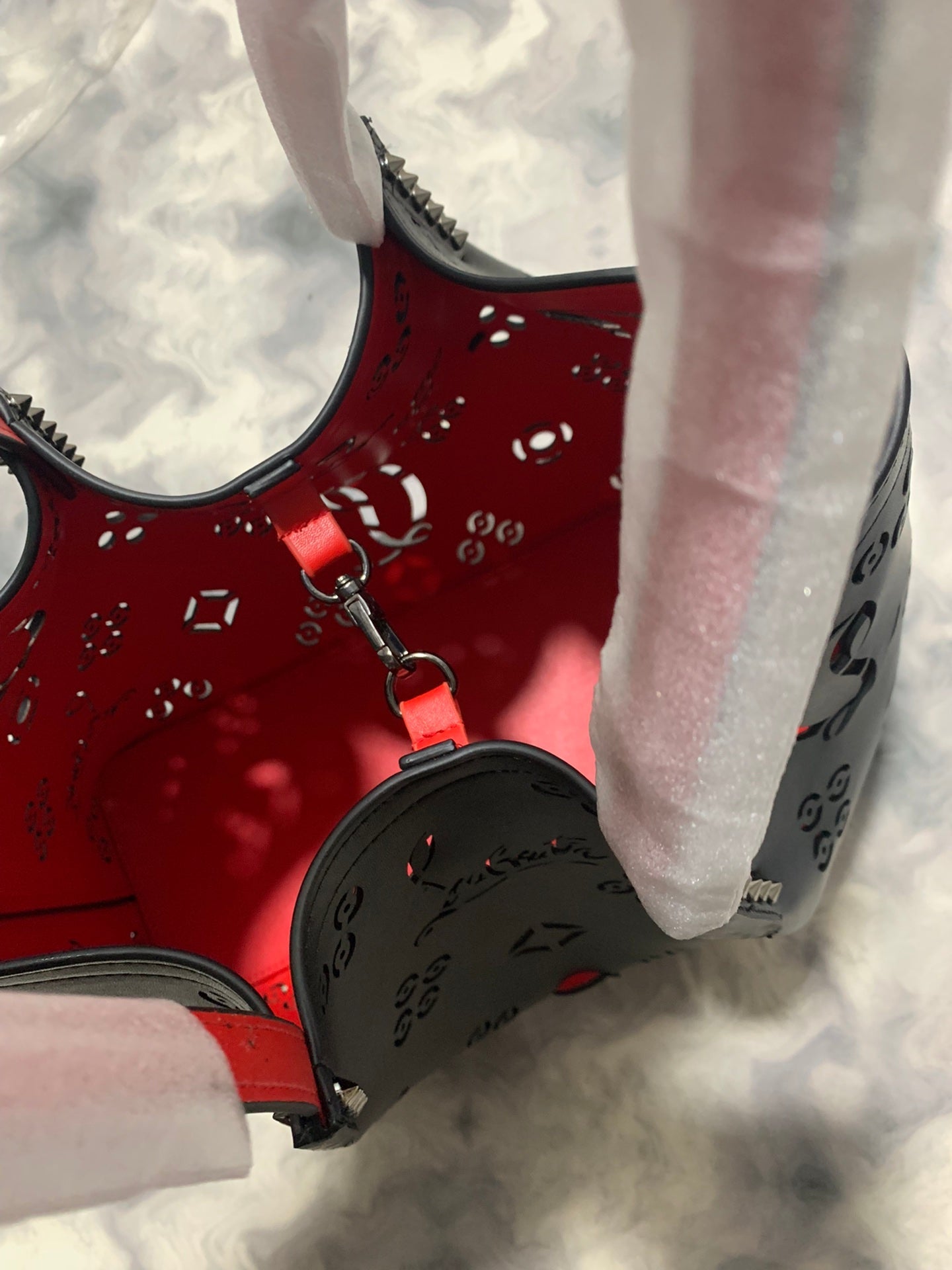 Christi** Loubout** hollow handbag